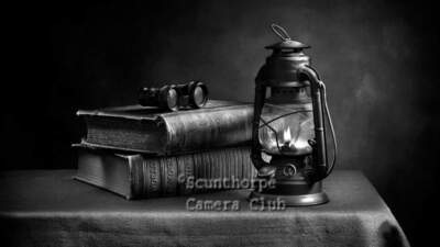 Reading by Lamplight 